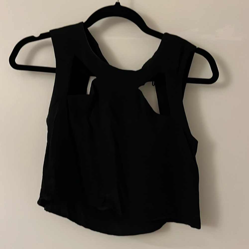 Cool asymmetrical tank made in Brazil! Farm Rio Size Small. Almost New.